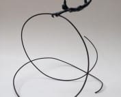 Capbussada. Perfil. Escultura en bronze. 2015
